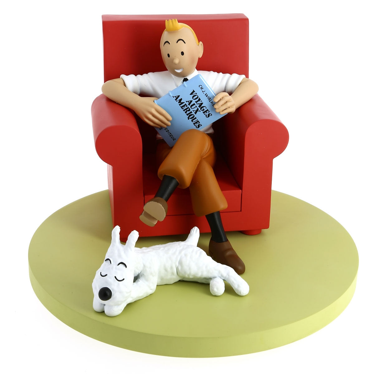 Tintin reading in a red armchair with Snowy resin figurine