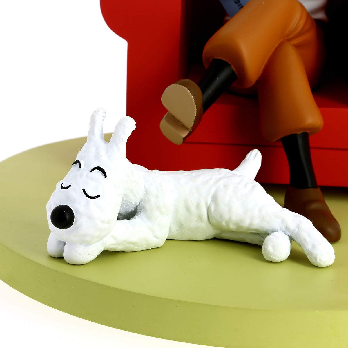 Tintin reading in a red armchair with Snowy resin figurine view 2