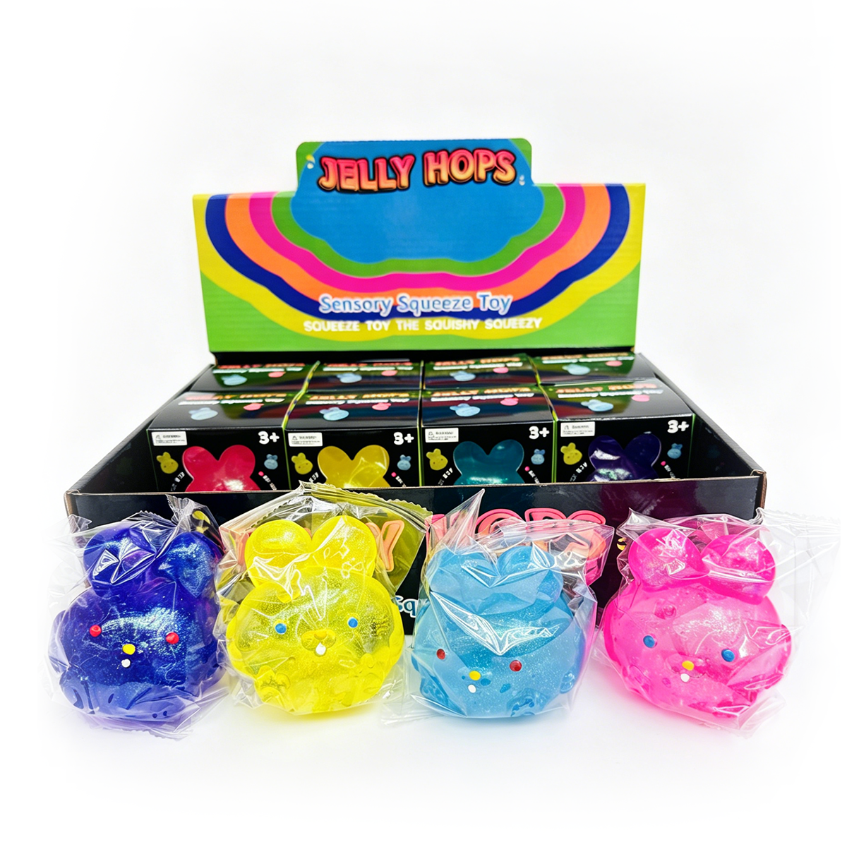Four assorted translucent gummy feel rabbit squishy toys with display box