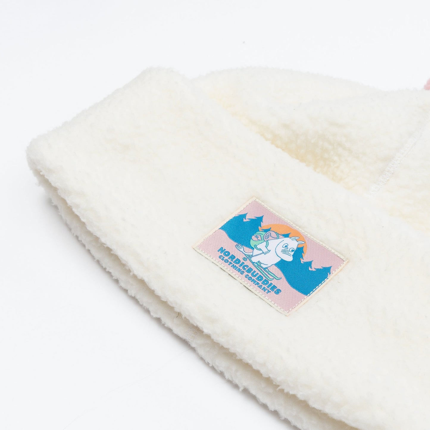 Close-up of Moomintroll patch on fleece beanie