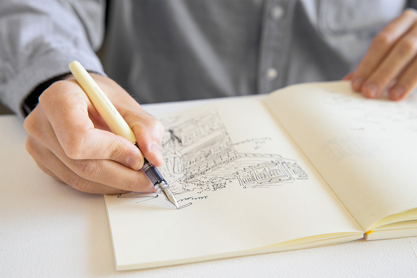 MD Fountain Pen being used for sketching in a notebook