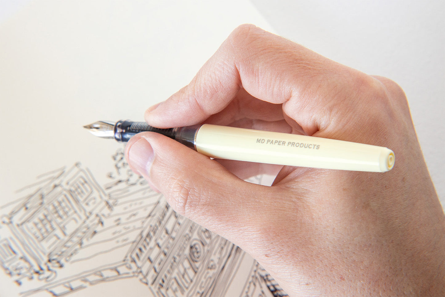 MD Fountain Pen cream body and transparent grip in hand